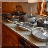 K13. Pots and pans. 